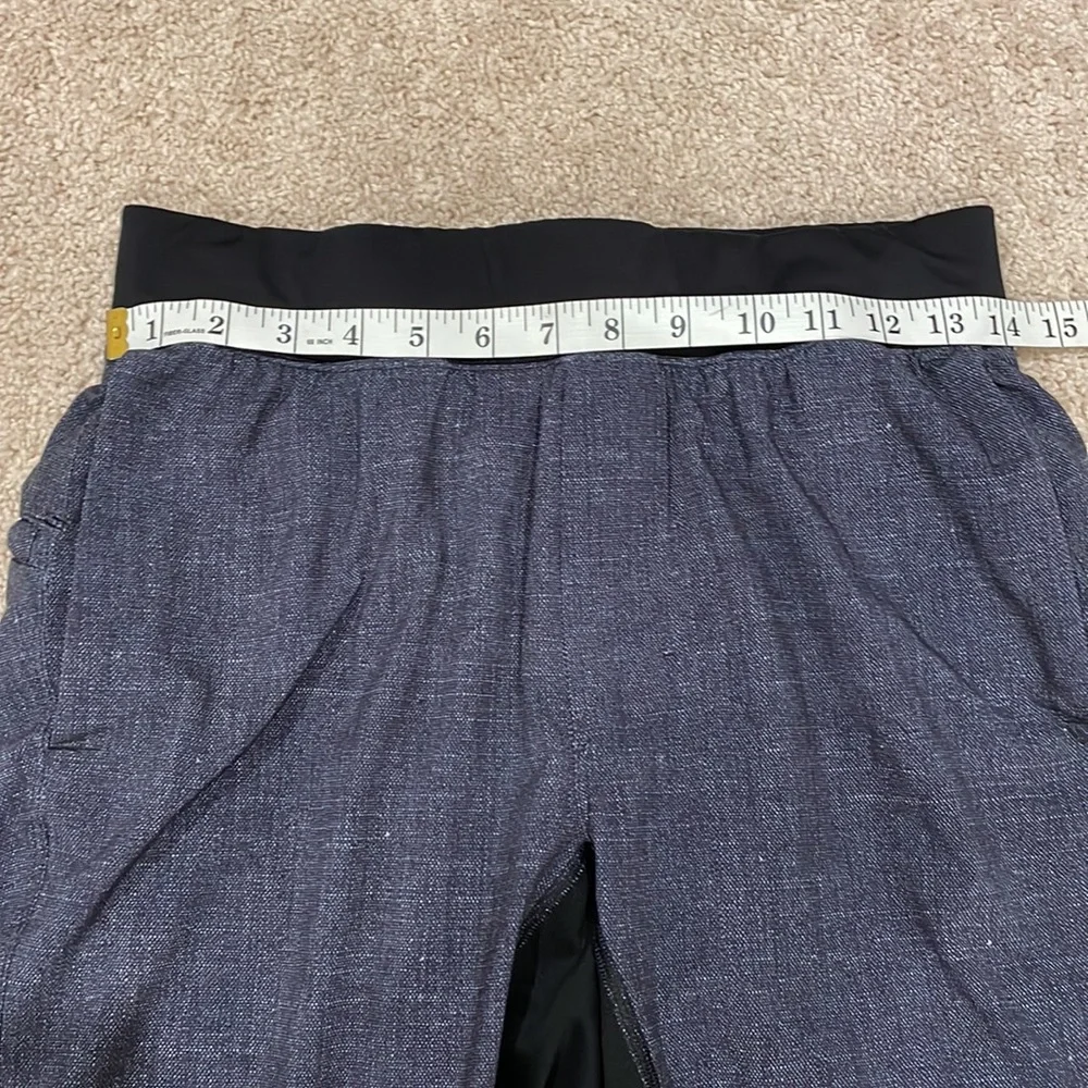 Lululemon Dark gray and black mens shorts.